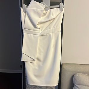 La Plateau size 40. Just worn one time for my milestone birthday.